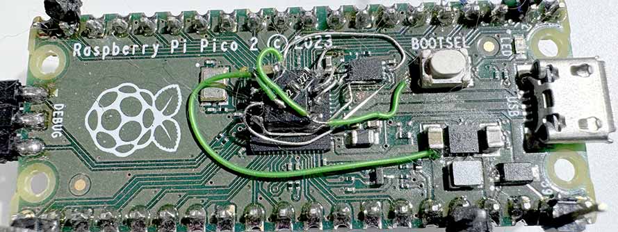 rPi Pico 2 with a deadbuged SOIC-8 PSRAM chip on it