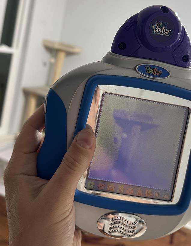 Pixter Camera being shown working. Image is barely discernible.