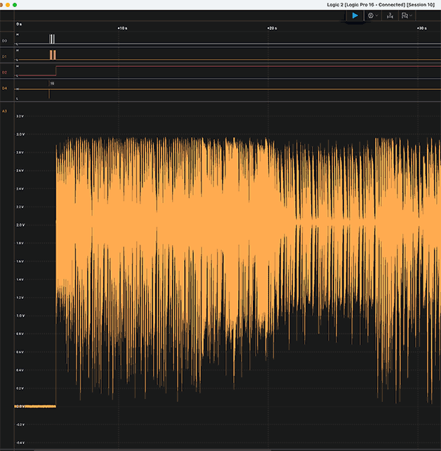 Screenshot of Saleae Logic program showing a few digital channels and one analog channel being captured. Analog channel has a lot of signal - it is music