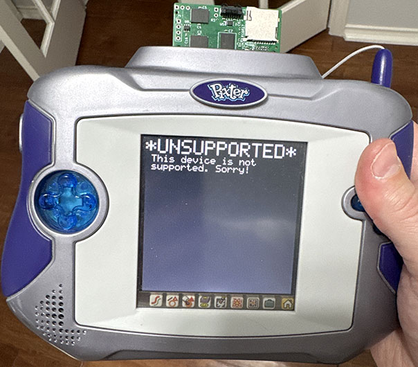 Pixter Multimedia showing a simple white message on black background that it is the wrong device to boot this cart